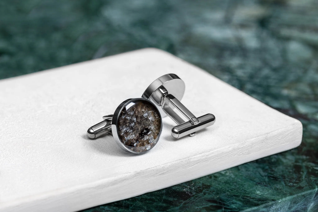 3. Close-up of Eherüs cufflinks with unique fish scale pattern on white surface