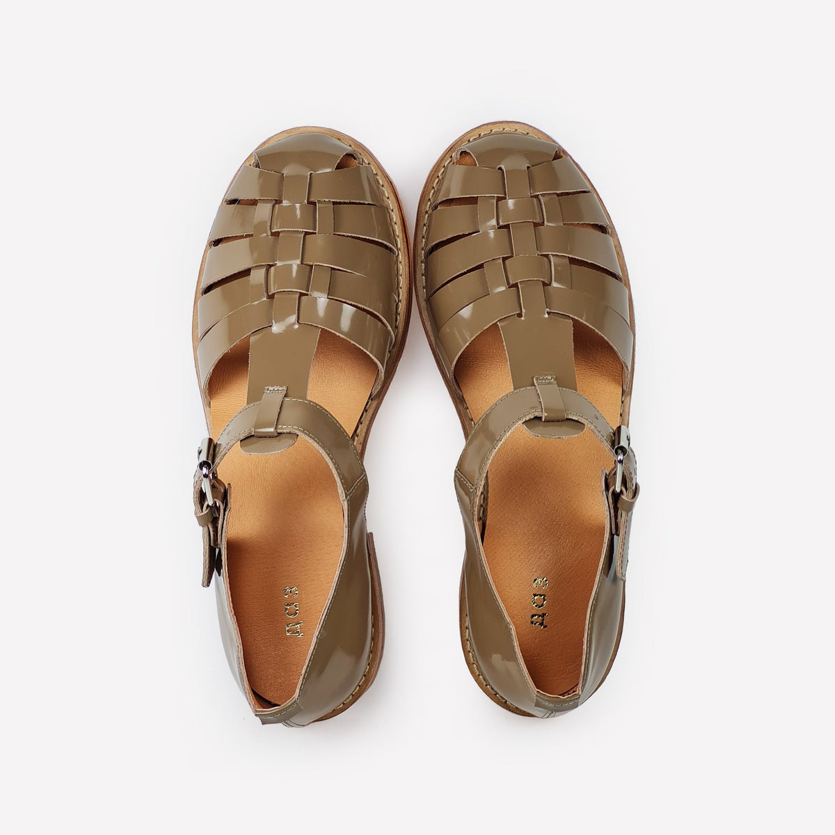 6. Overhead view of women's handmade beige leather fisherman sandals showing strap design