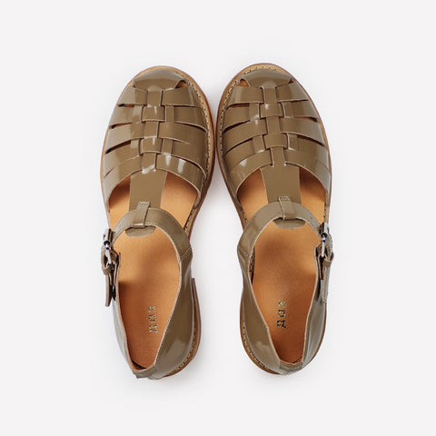 6. Overhead view of women's handmade beige leather fisherman sandals showing strap design