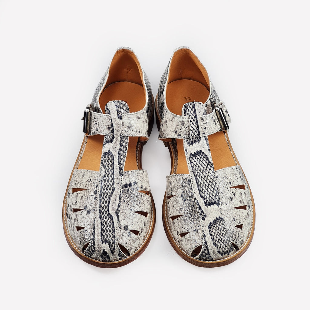 1. Handmade snake print sandals by Daz Studio with adjustable strap and silver-tone buckle, shown from top view