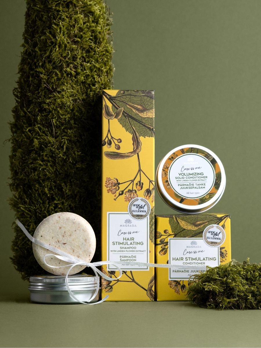 1. Magrada Organic Cosmetics Volumizing Hair Set with liquid and solid options, featuring honey-sweet scent and Pro-Vitamin B5, shown in lifestyle setting with natural elements