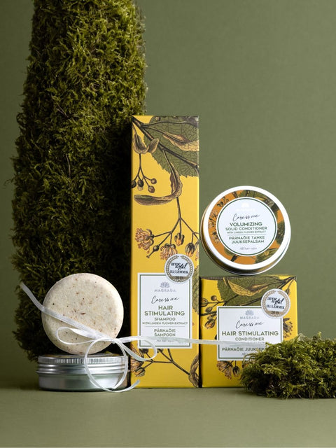 1. Magrada Organic Cosmetics Volumizing Hair Set with liquid and solid options, featuring honey-sweet scent and Pro-Vitamin B5, shown in lifestyle setting with natural elements