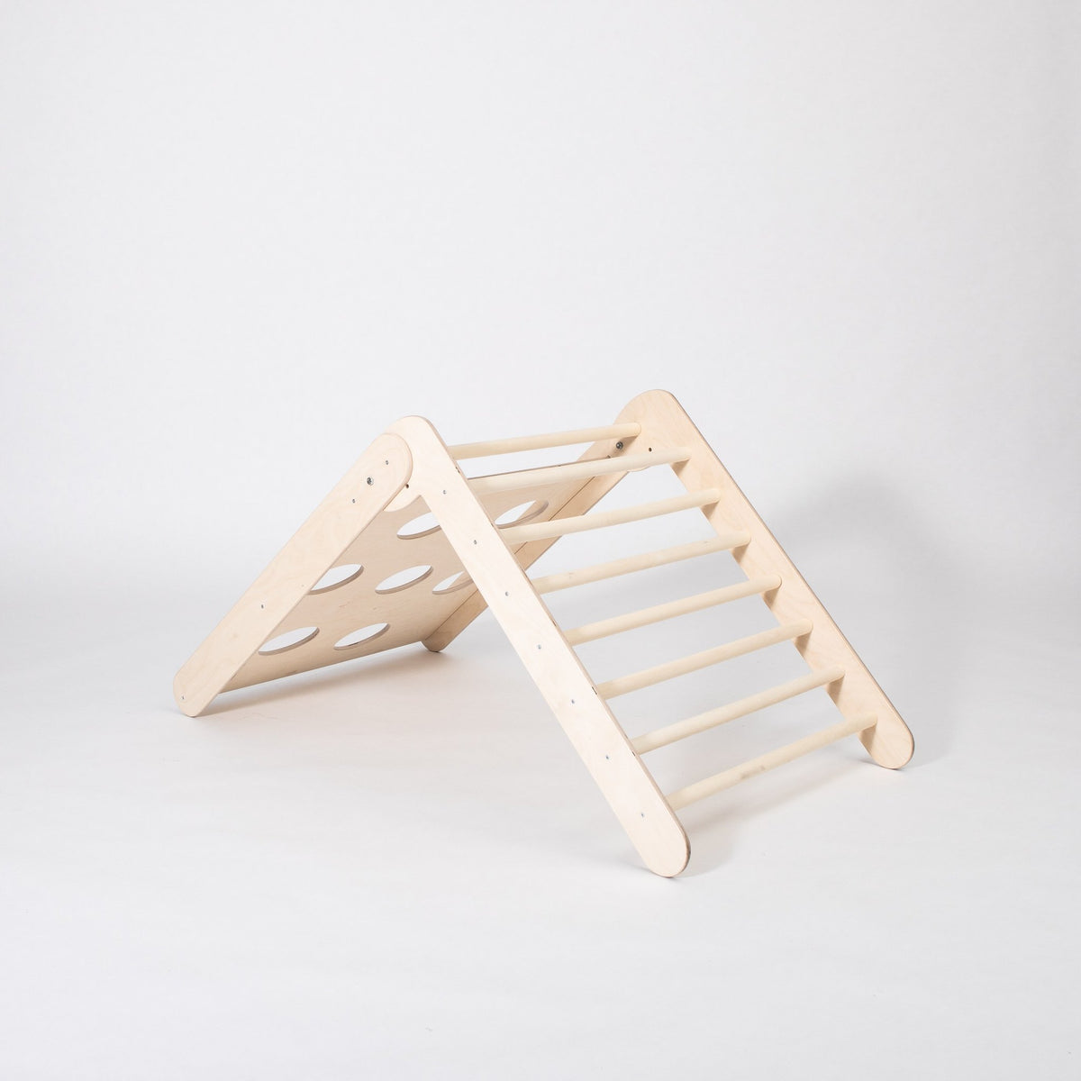 2. Studio shot of foldable Montessori climbing triangle made from Baltic birch plywood with adjustable slope levels on white background
