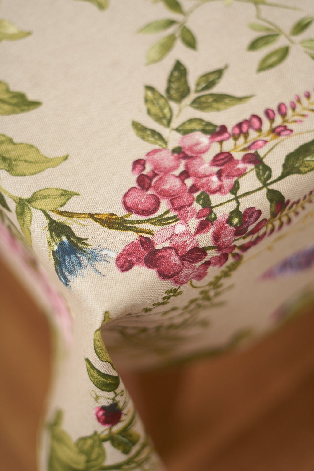 2. Close-up of Botanico tablecloth by Hortensias Home, highlighting detailed floral pattern on cotton-polyester blend