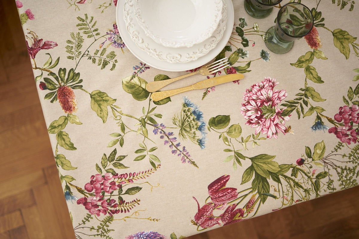 3. Top view of Botanico rectangular tablecloth by Hortensias Home, featuring colorful botanical design with tableware
