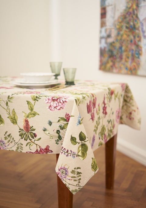 1. Botanico rectangular tablecloth by Hortensias Home on dining table, showcasing vibrant floral print in a lifestyle setting