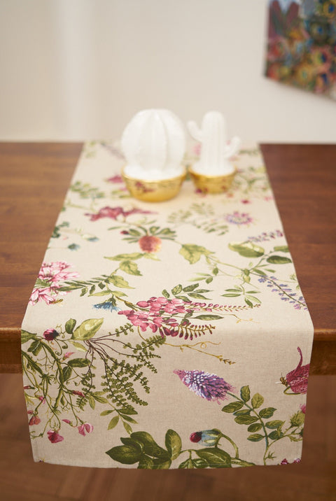 1. Hortensias Home Botanico table runner with floral print on dining table, lifestyle setting