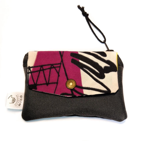 1. Drinbags PAINT wallet with abstract design, featuring a metal press button and zipper closure, shown in studio
