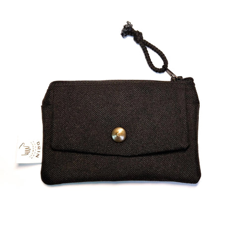 1. Drinbags BLACK HOLE wallet in black cotton with metal press button and zipper closure, shown in studio setting