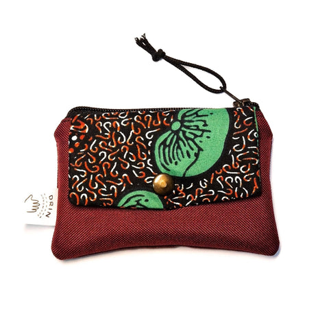 1. Drinbags BEAN wallet with vibrant patterned flap and burgundy body, featuring a metal press button and zipper closure, studio shot