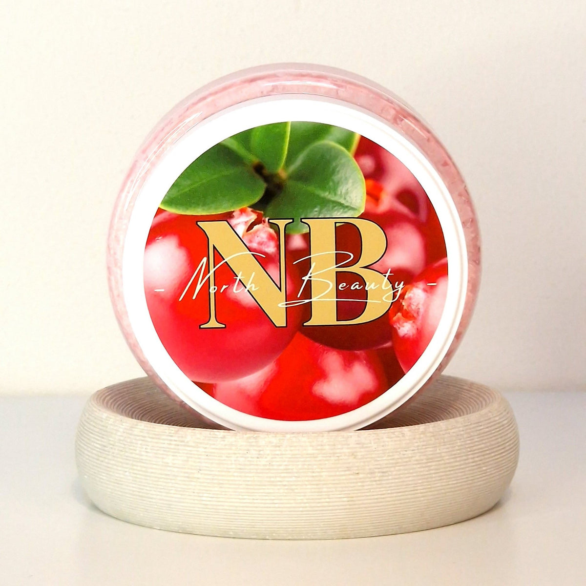 2. North Beauty Whipped Body Scrub with Cranberry, featuring vibrant cranberry imagery on the lid
