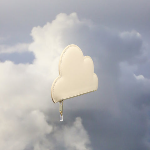 2. Side view of Tairi Roosve beige leather cloud purse with Swarovski crystal zip in cloudy setting