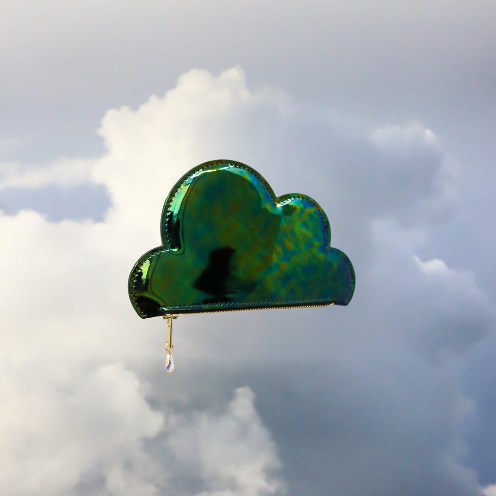5. Iridescent Leather Cloud Purse by Tairi Roosve, floating in front of clouds