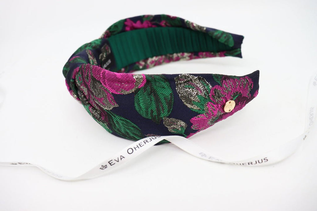 6. Close-up of Knot Headband Flora by Eva Oherjus, highlighting floral motif and green Mulberry silk lining