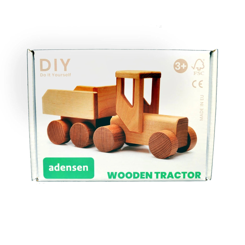 4. Packaging of Adensen DIY Wooden Tractor showing unpainted birchwood toy with green brand logo and age recommendation 3+