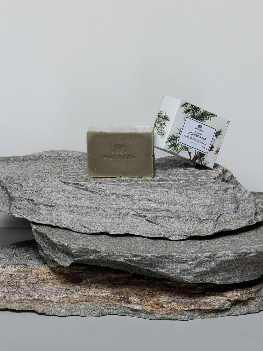 1. Magrada Organic Cosmetics Juniper and Sea Mud Soap displayed on natural stone, highlighting packaging and soap bar