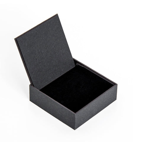 3. Open minimalist black gift box with PALU branding for Maarja Palu TECTONICS earrings