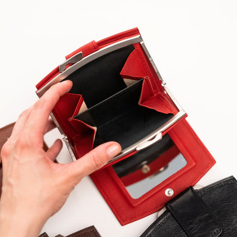 3. Close-up of Papillon women's red leather wallet with open coin pocket and mirror, highlighting interior design