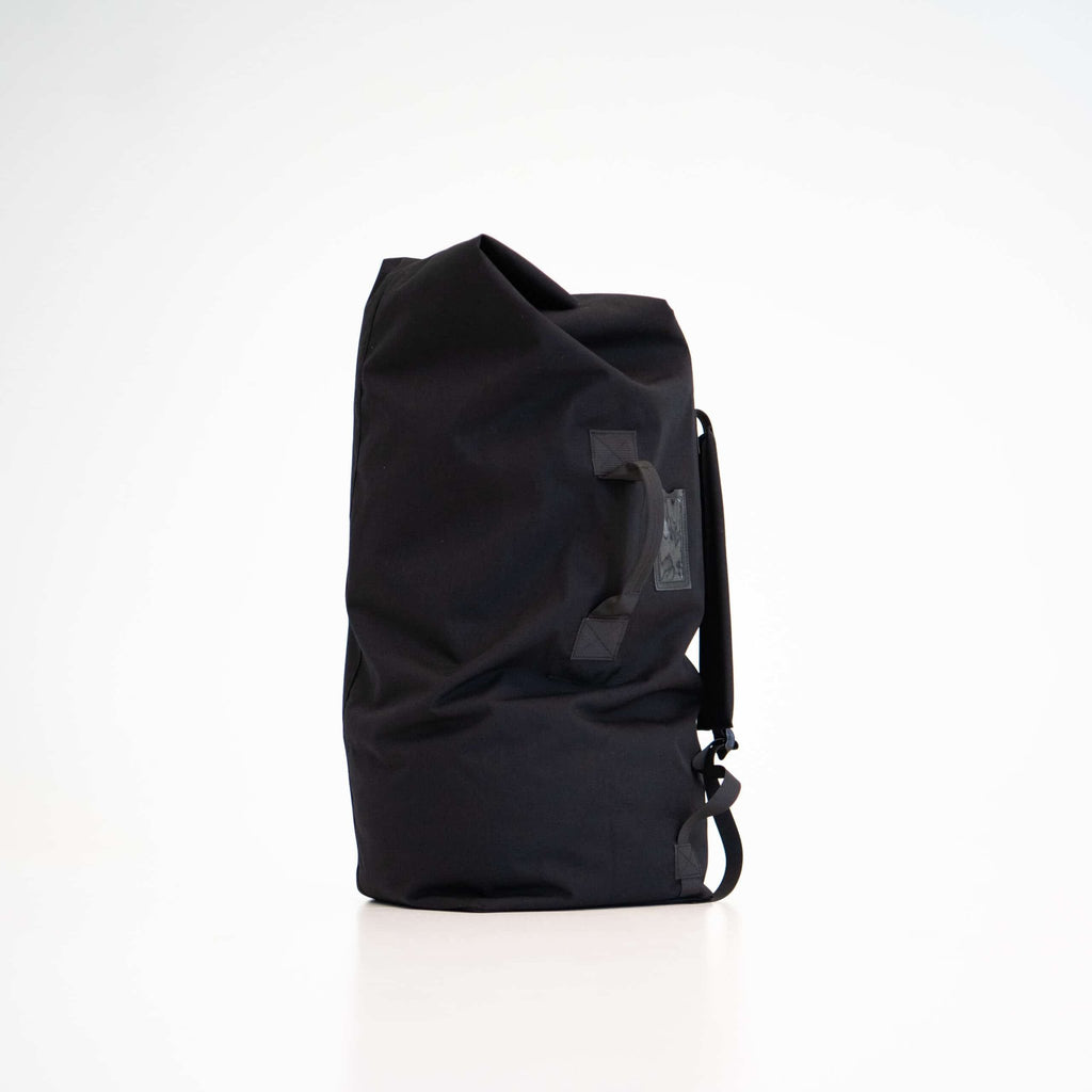3. Studio shot of black Galvi Linda Duffle Bag 047 showing side view with handle