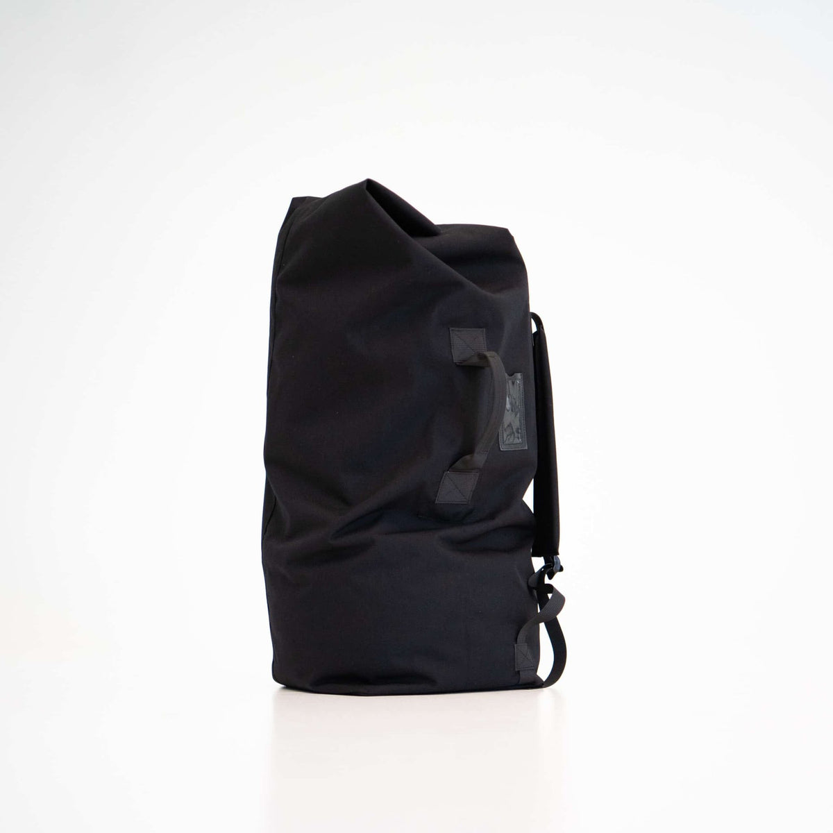 3. Studio shot of black Galvi Linda Duffle Bag 047 showing side view with handle