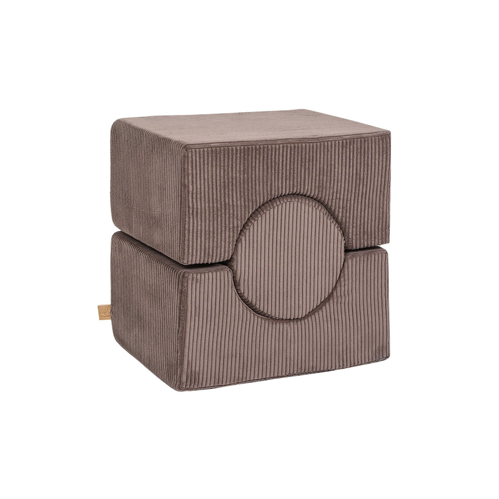 3. Close-up of brown velvet corduroy children's play set with circular and rectangular shapes stacked