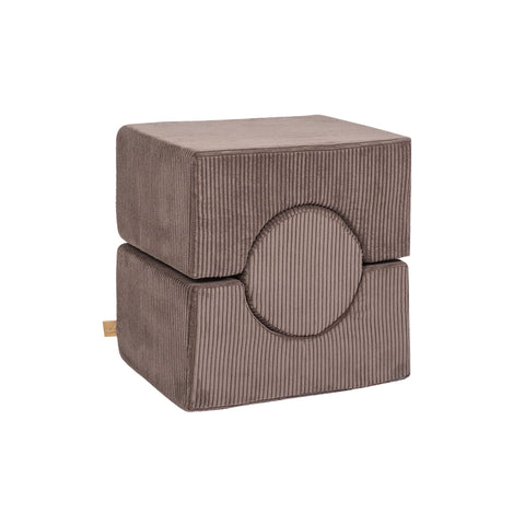 3. Close-up of brown velvet corduroy children's play set with circular and rectangular shapes stacked