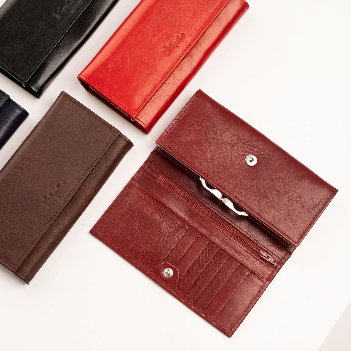 3. Women's Bordeaux leather wallet by Papillon with card slots and coin pocket, shown open with other color options