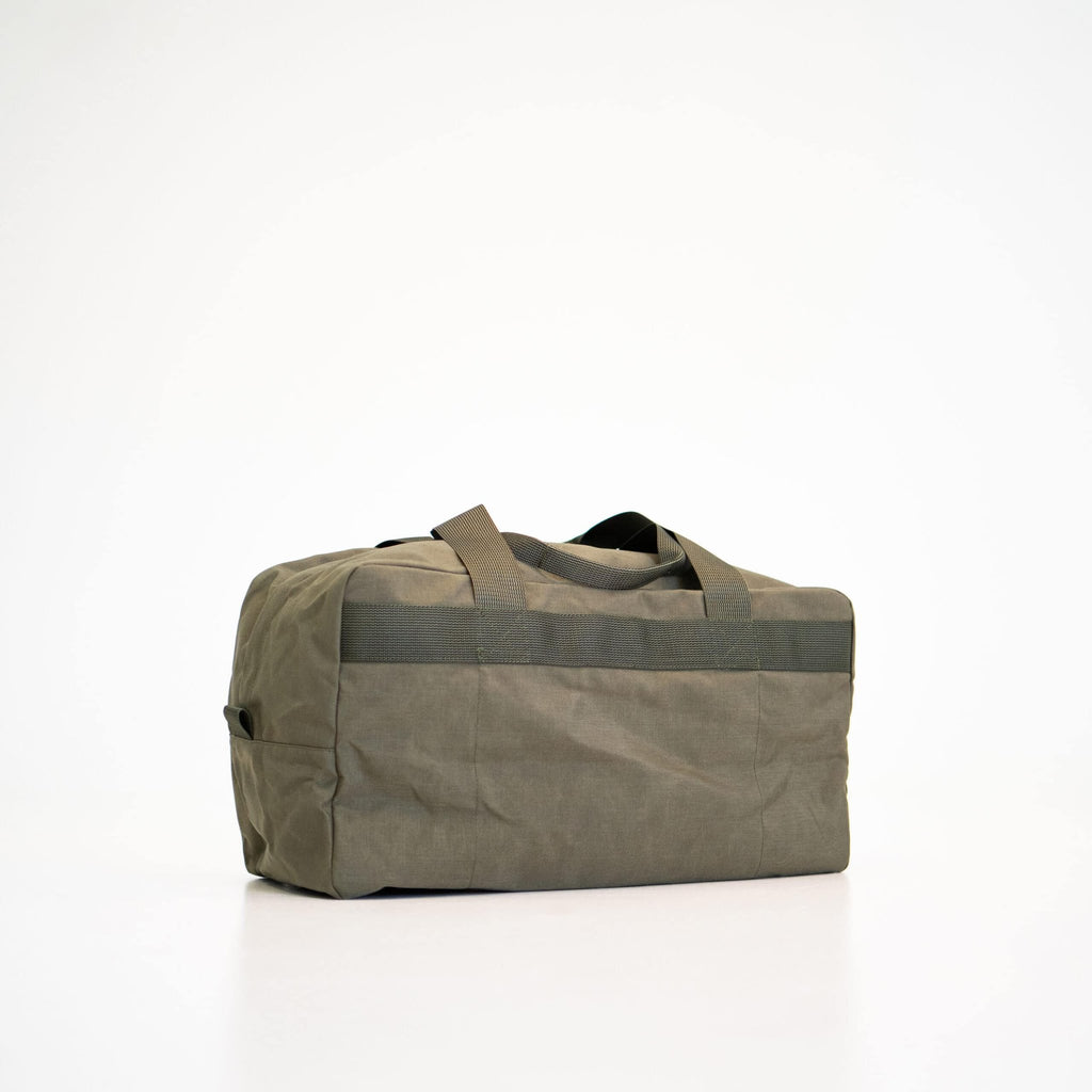 4. Side view of Galvi Linda Travel Bag 008 in military green, emphasizing spacious design
