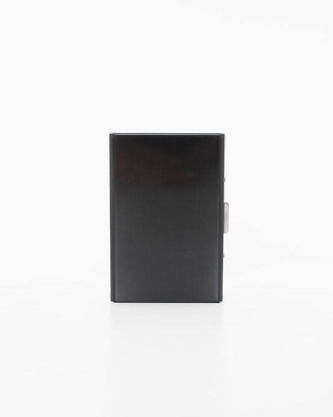 3. Nabo NK285 black metal card holder shown closed, highlighting sleek design in studio