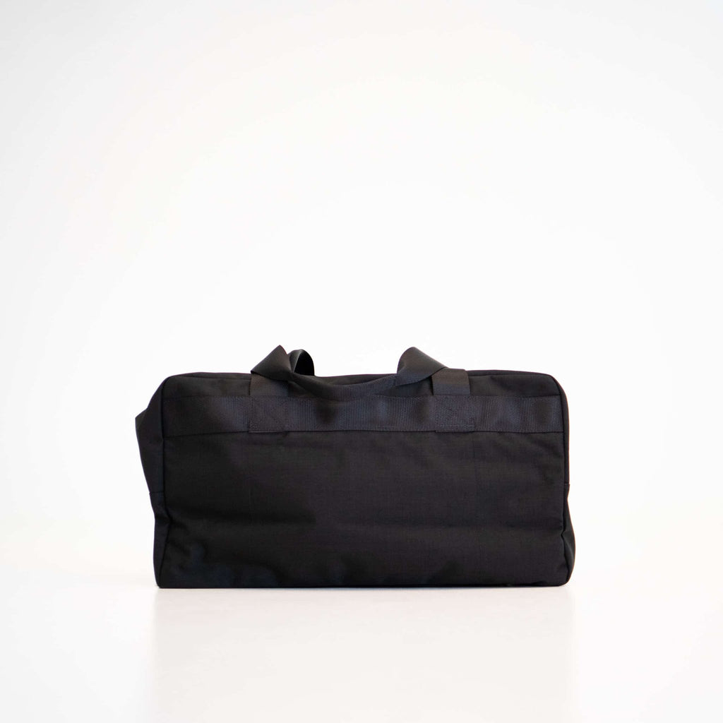 4. Back view of Galvi-Linda Travel Bag 008 in black, emphasizing durable Cordura fabric and craftsmanship