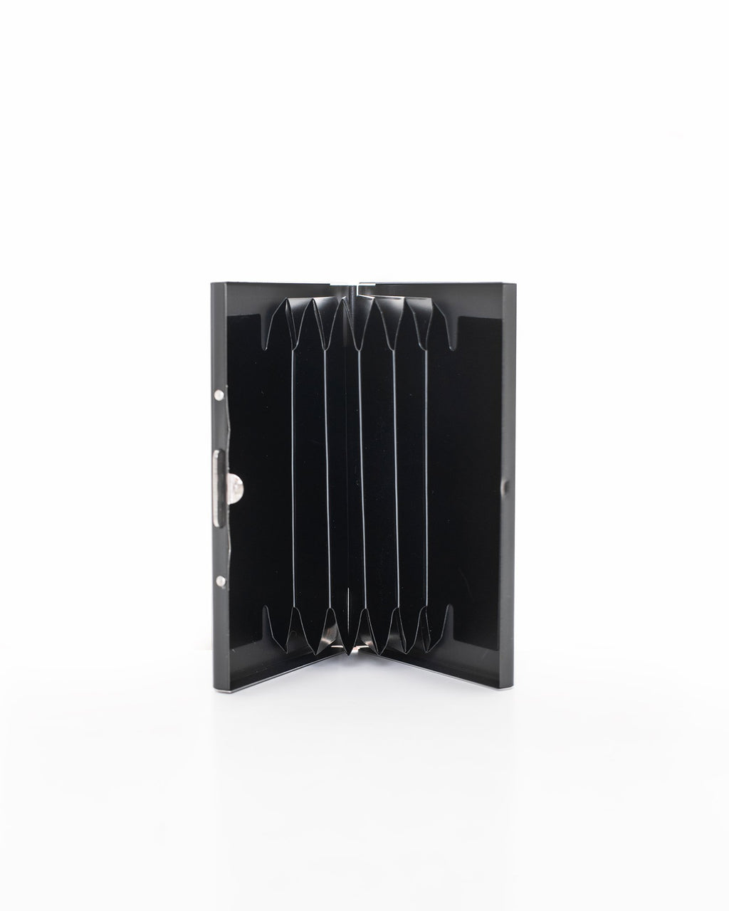 2. Open view of Nabo NK285 black metal card holder displaying six card slots in studio