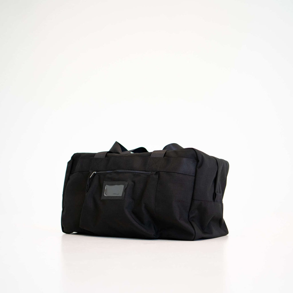 2. Studio shot of Galvi-Linda Travel Bag 008 in black, highlighting spacious main compartment and zippered pockets