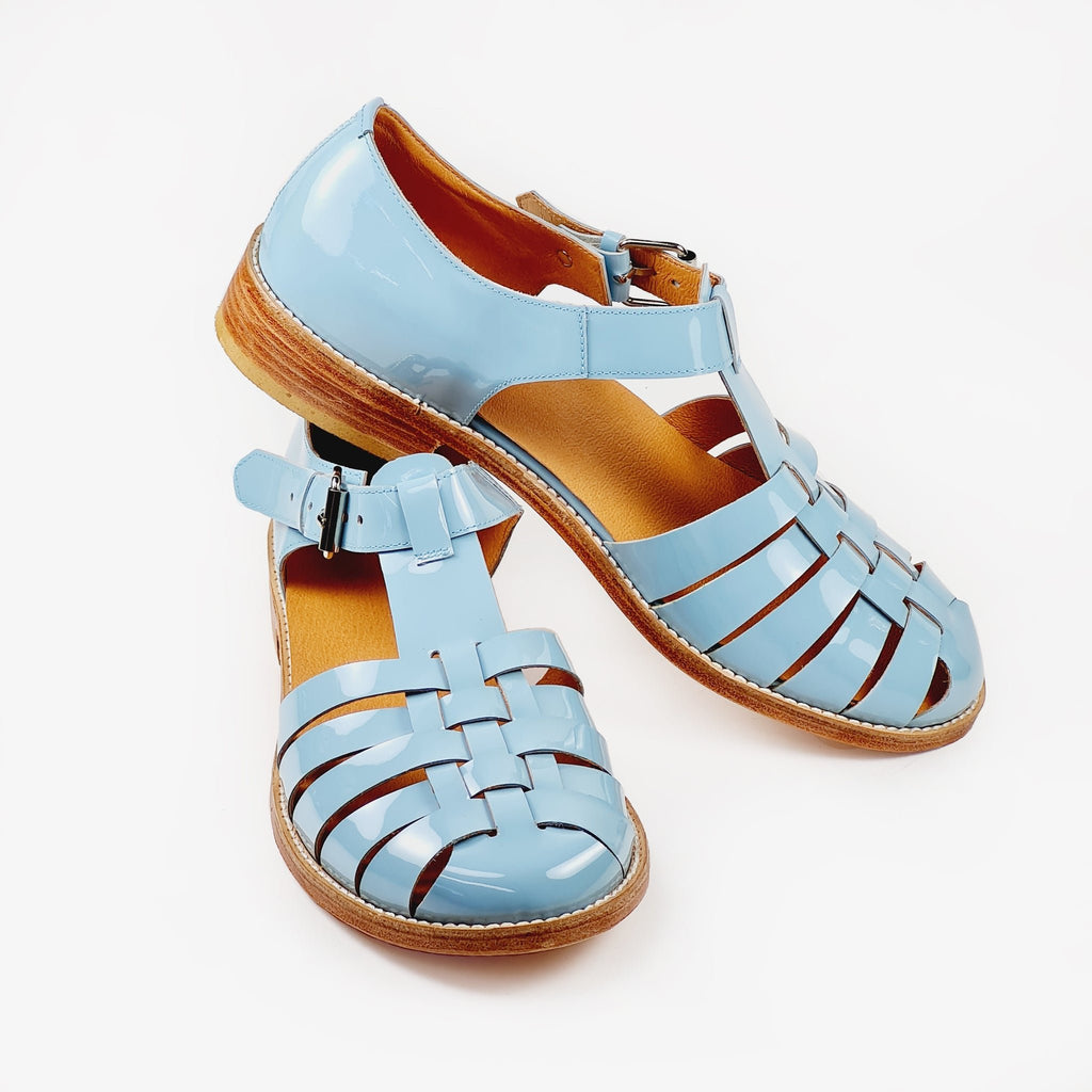 3. Studio shot of handmade leather fisherman sandals in light blue by Daz Studio, side view