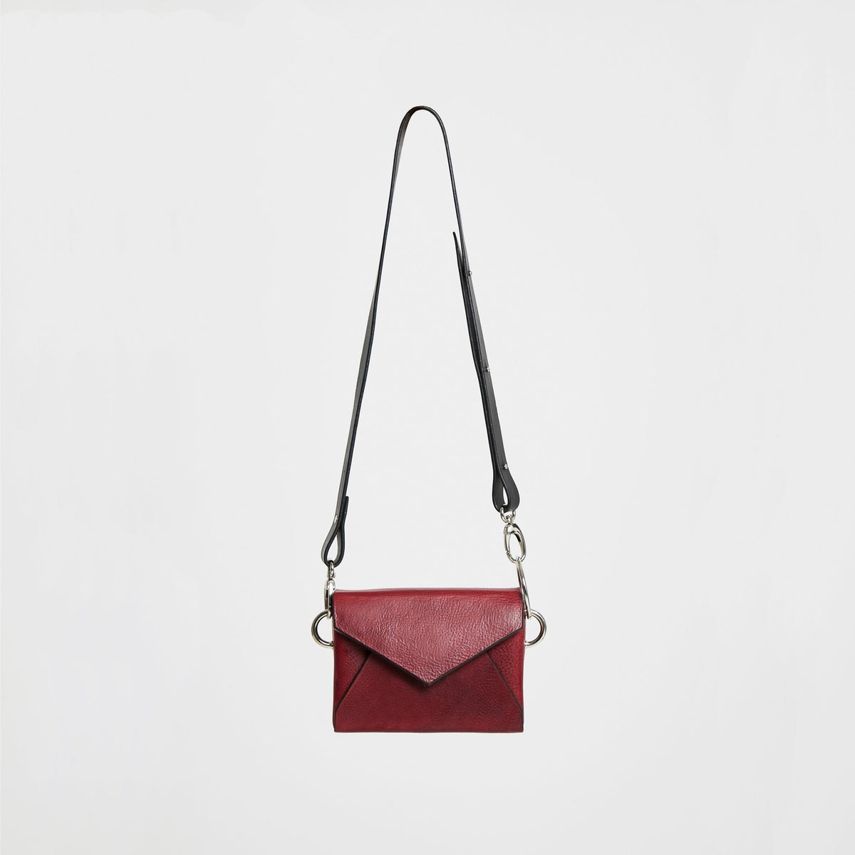 4. Studio shot of Daz Studio burgundy leather envelope bag with adjustable strap, shown from front