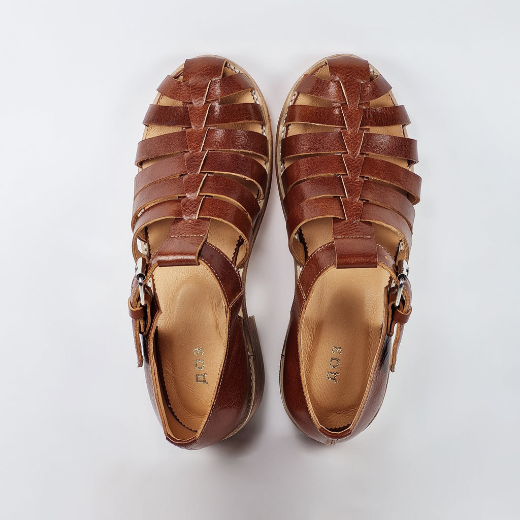 5. Overhead view of brown leather fisherman sandals by Daz Studio, highlighting silver-tone buckle