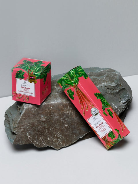 3. Magrada Organic Cosmetics Rhubarb Shampoo packaging with aloe extract, displayed on a rock