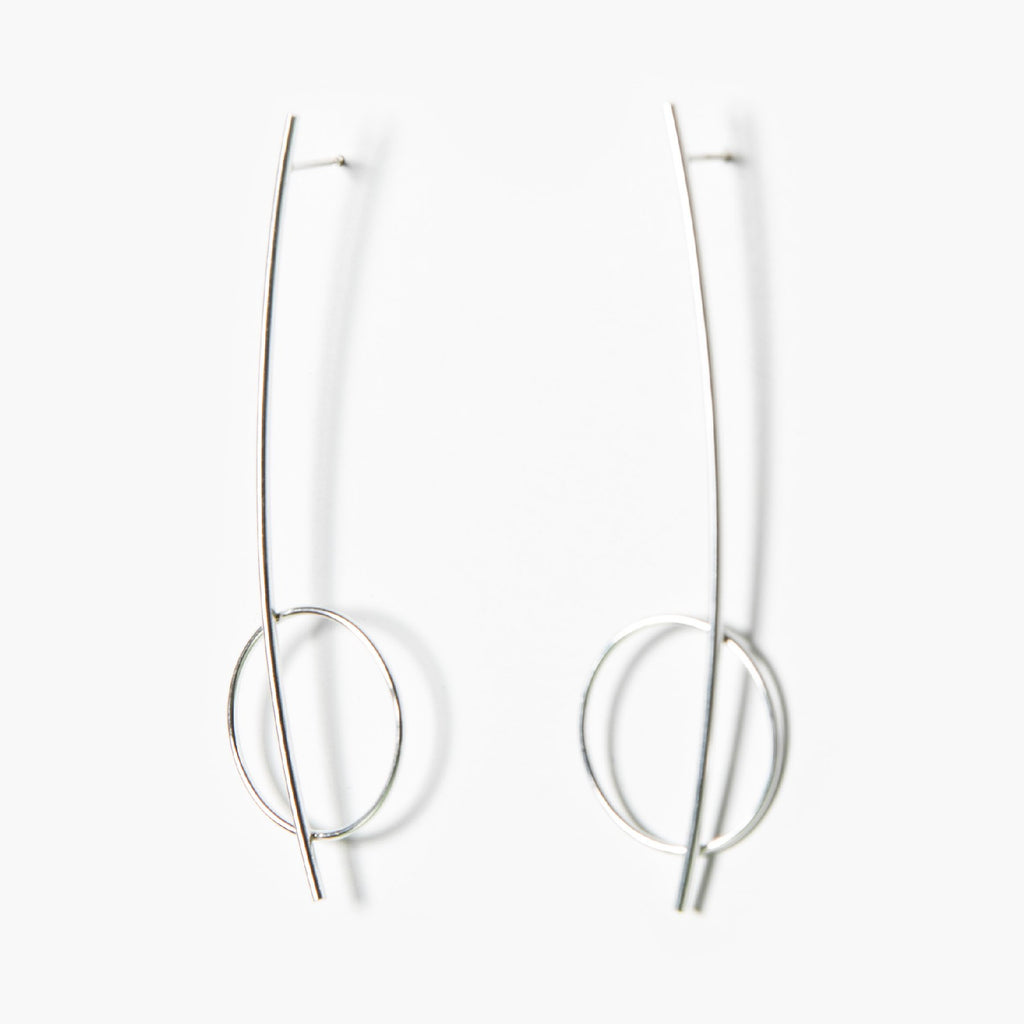 2. Studio image of Maarja Palu HARMONY silver earrings with sleek rods and delicate circles