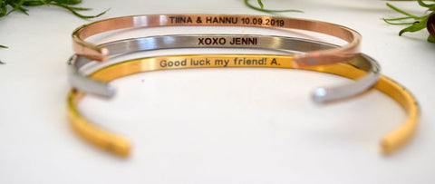 4. Close-up of Olla bracelets in silver, rose gold, and gold with personalized engravings