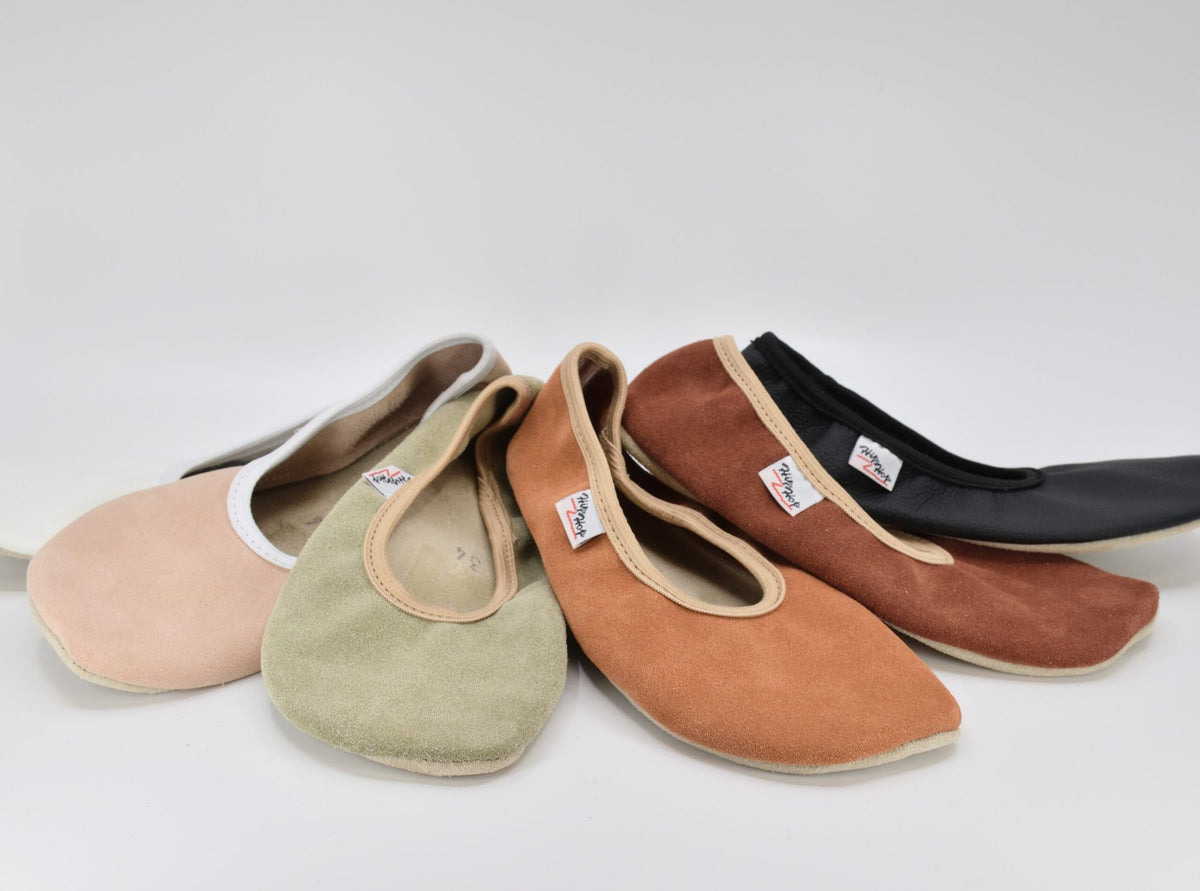 3. Studio shot of Hip-Hop barefoot slippers in multiple colors, highlighting leather material and design