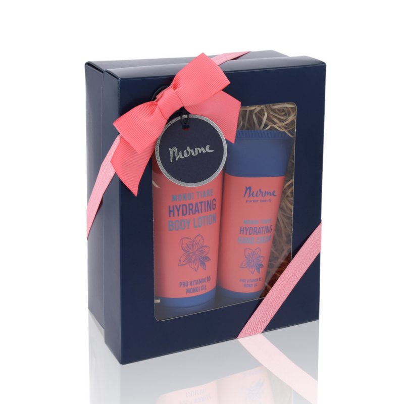 2. Nurme Monoi Body Care Gift Set in navy box with pink ribbon, featuring hydrating body lotion and hand cream