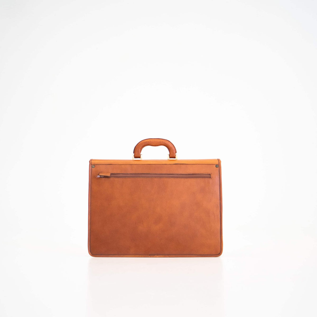 2. Back view of Papillon Leather Briefcase No. 99 in cognac, featuring A4-size zip pocket