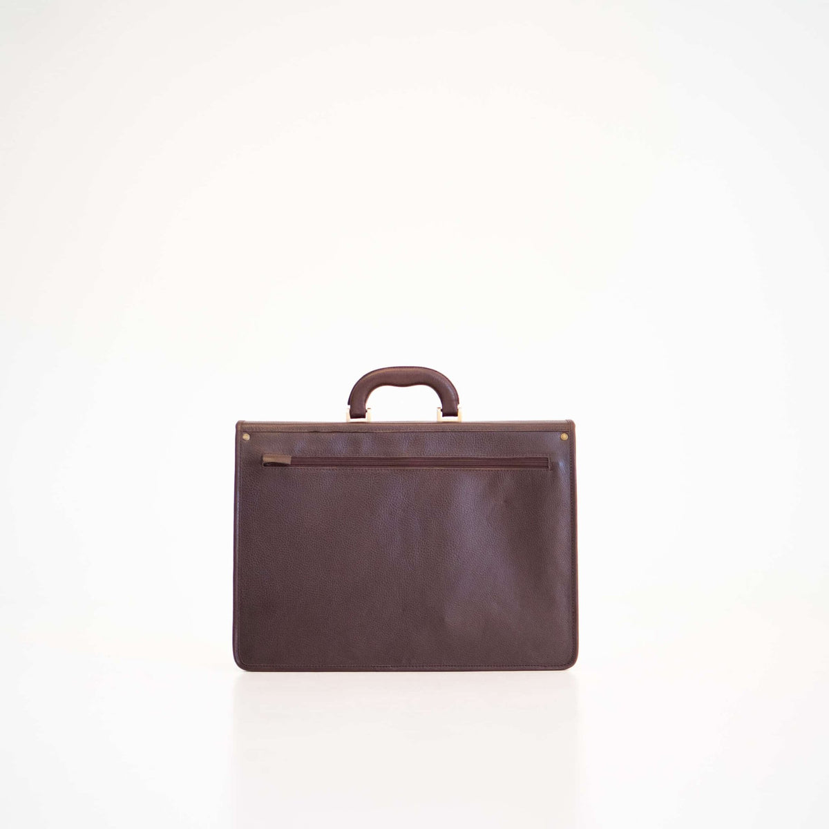 2. Back view of Papillon Leather Briefcase No. 99 in dark brown, featuring A4-size zip pocket