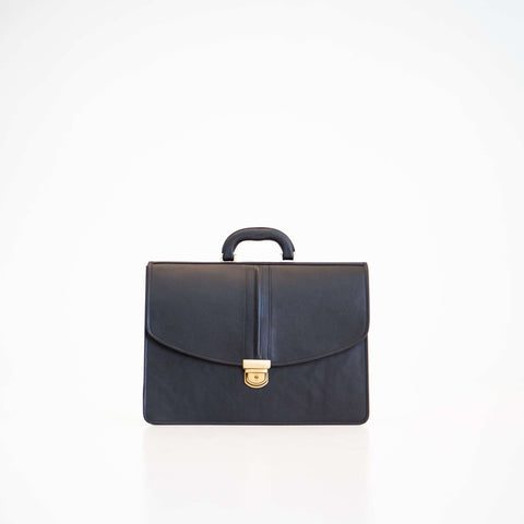 5. Studio shot of Papillon Leather Briefcase No. 99 in black, showing front view with handle
