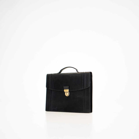 1. Papillon Briefcase No. 21 in black leather, front view with gold clasp, studio setting
