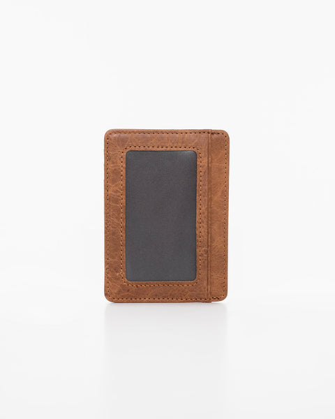 2. Nabo NK323 brown leather card holder with RFID-blocking, showing back with transparent slot in studio