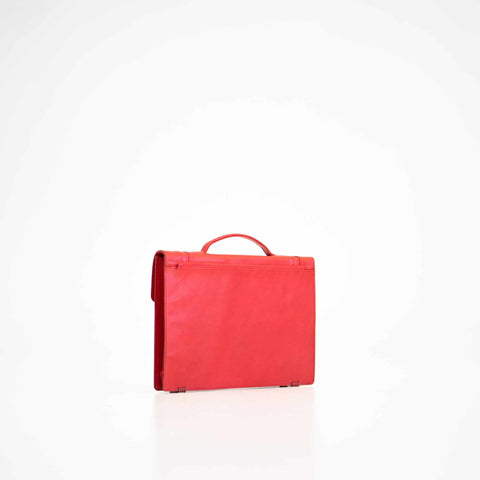 3. Side view of Papillon Briefcase No. 21 in red leather, studio setting