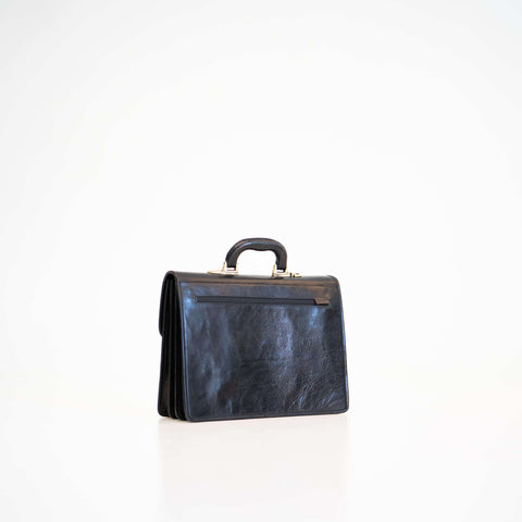 2. Back view of Papillon Briefcase No. 20 in black leather, featuring zippered pocket for A4 documents