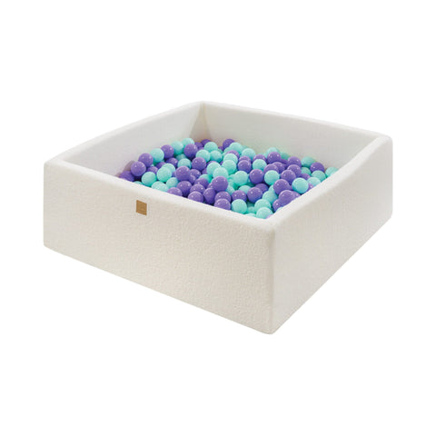 1. MeowBaby white boucle square ball pit filled with purple and mint balls, designed for toddlers, shown in a clean studio setting