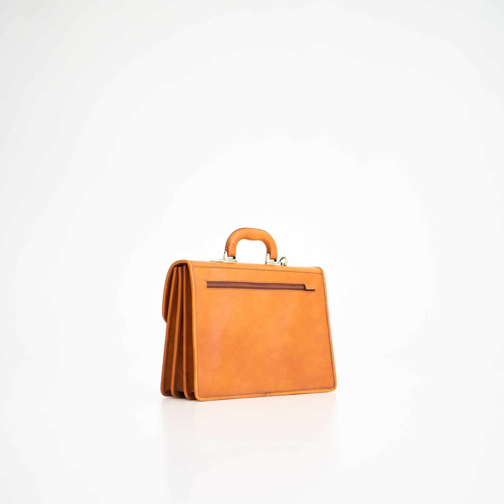 5. Angled back view of Papillon Briefcase No. 20 in cognac leather, highlighting craftsmanship