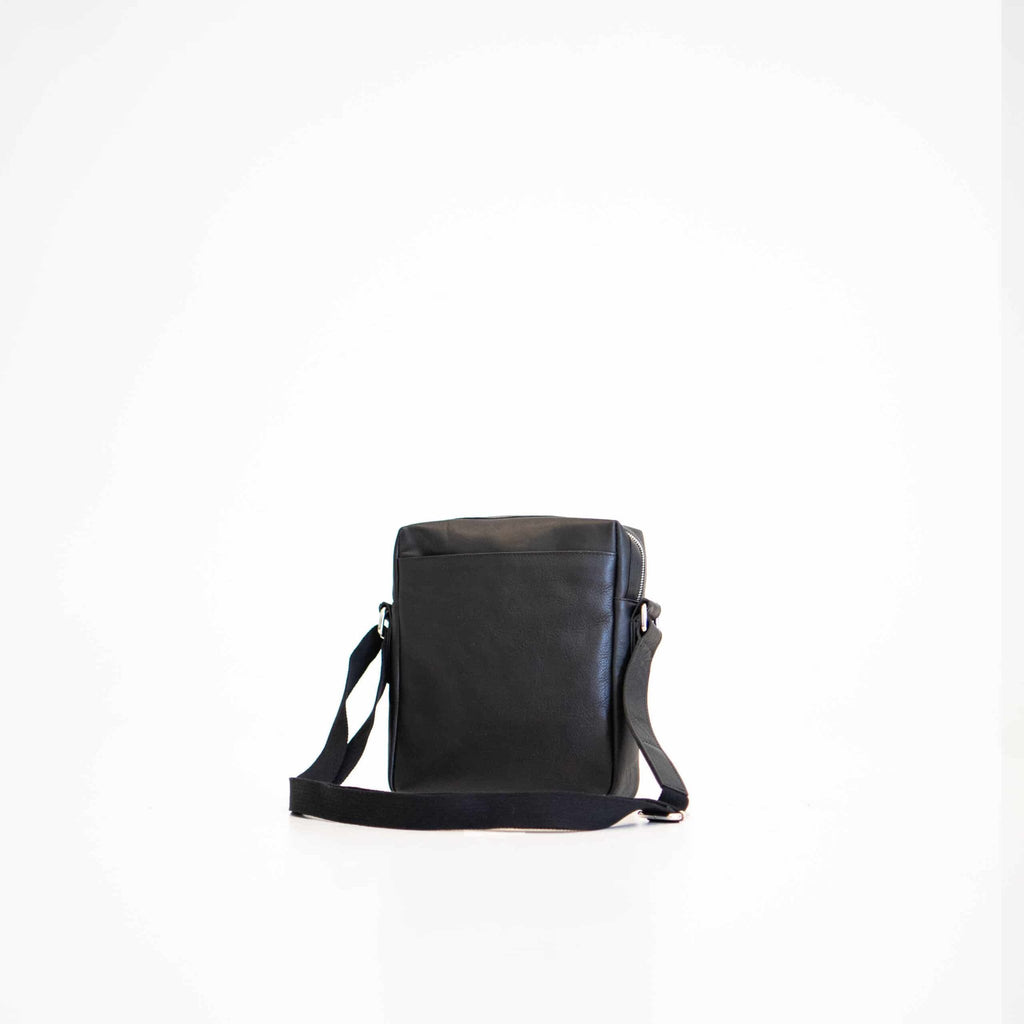 3. Studio shot of Papillon Small Shoulder Bag No. 37 in black leather, back view showing sleek design